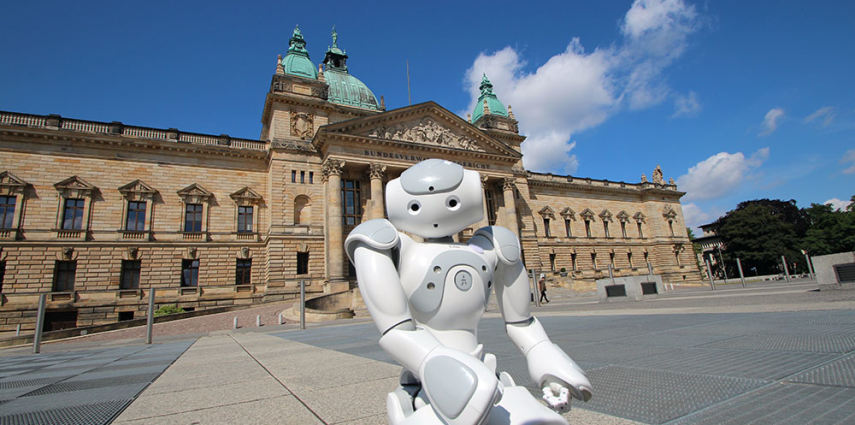 Leipzig will host the 20th RoboCup. Ellie, a robot from Aldebaran, discovers Leipzig's downtown area - this image shows the Federal Administrative Court. 
Image: Leipziger Messe GmbH